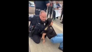 Women arrested for throwing drink at police officer's head. Kannapolis, North Carolina