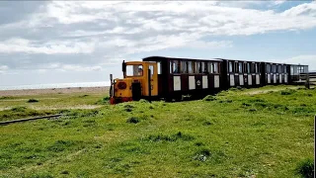 One of the Hayling Island UK Seafront Train Engines running in the sunshine