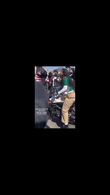 Woman Peacefully Rams Cops With Motorcycle Because They're Deporting Her People
