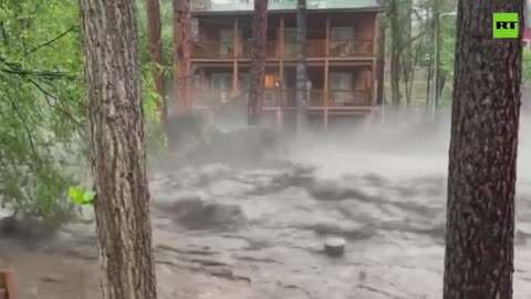 POWERFUL floodwaters rush through Ruidoso, New Mexico
