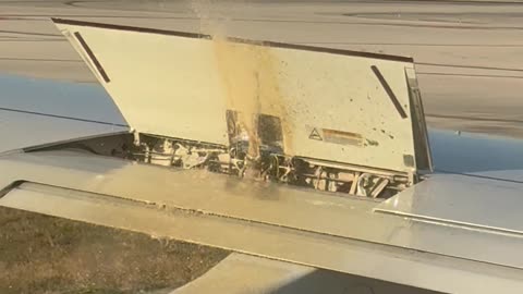 Fluid Spurting From Airplane Wing