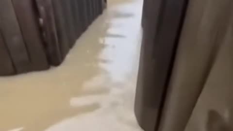 Russian Soldiers Dealing with Flooded Trenches After Dam Collapse