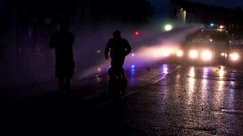 Northern Ireland burns for a third night, police unleash water cannon