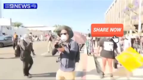 The reporter gets hit with a rubber bullet