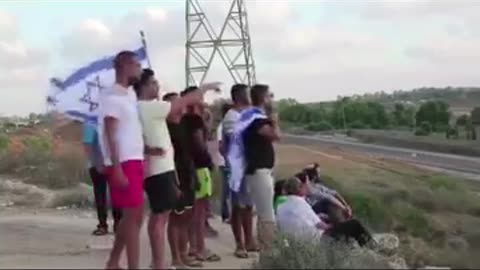 JEWS not ISRAELITES enjoying the front seat of watching the bombing of Palestine 2014