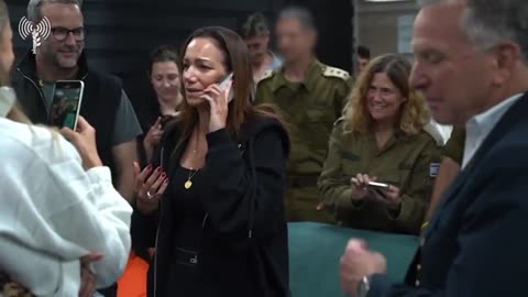 Edan Alexander's mother takes the phone from Steve Witkoff to talk to her son.