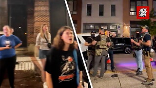 Protesters line up in DC and yell at police after Trump announces crime crackdown