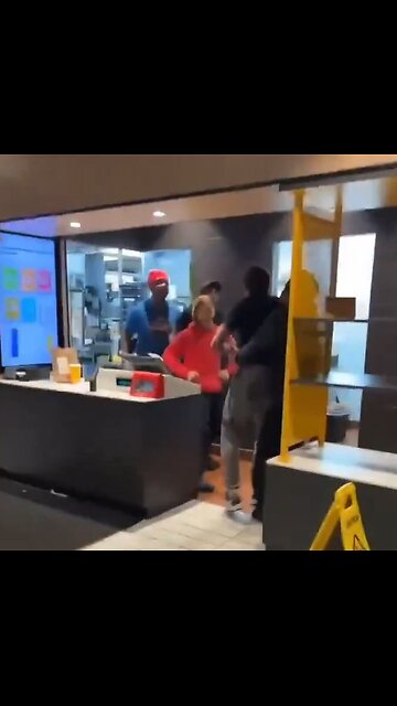 McDonald's crew gang fight customer coming behind counter to throw food