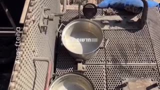 Gazan children play with the remnants the IDF left behind in the Strip