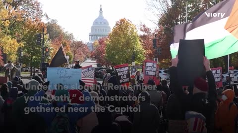 Activists, ex-soldiers rally against Trump in DC on Veterans Day