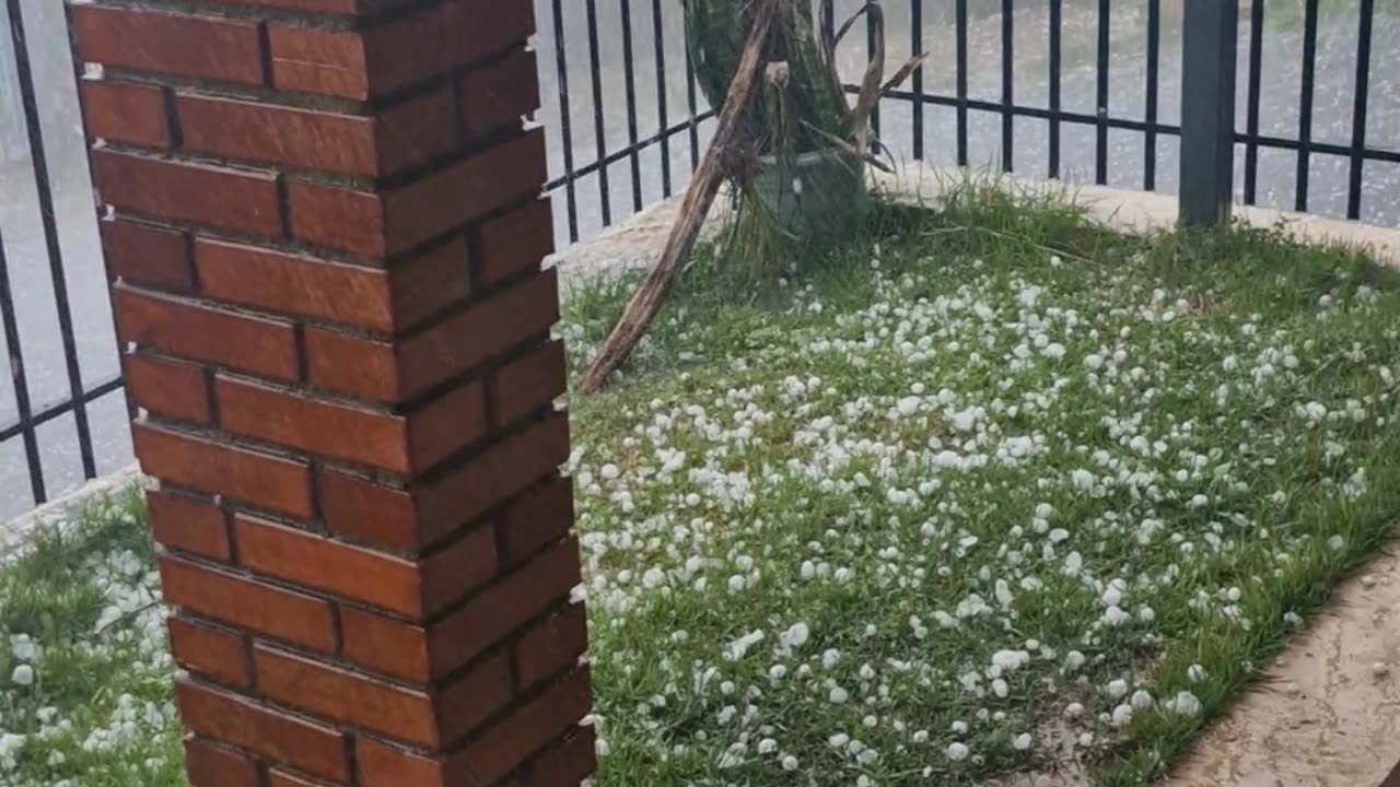 Heavy Hail Pelts Porch in Sarandi