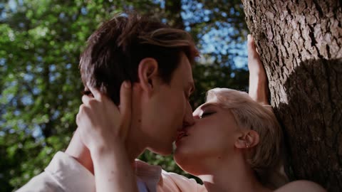 A Couple in Love Kissing At Tree, Lovely