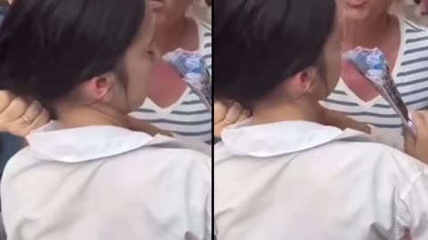 American tourist grabs pickpocket by ponytail, does not let go till purse returned