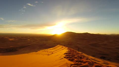 Time lapse sunrise in the Sahara Desert, Morocco.