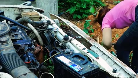 A girl Restoring a car washed away by floods all by herself!
