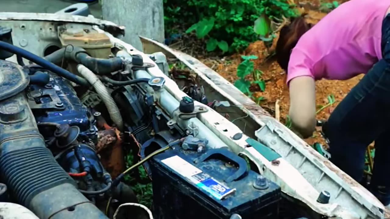 A girl Restoring a car washed away by floods all by herself!