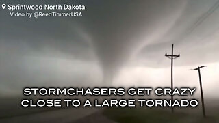 Stormchasers Get Crazy Close to a Large Tornado