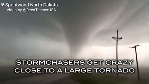 Stormchasers Get Crazy Close to a Large Tornado