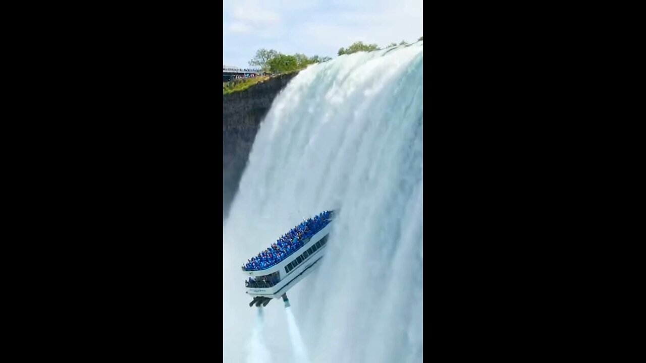 Joseph Martelli Niagara Falls, NY Boat and people go up Niagara Falls