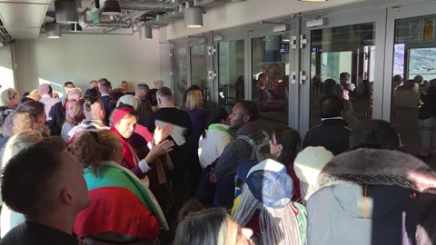 Crowds have begun gathering, waiting for the doors to open for the first session of the conference.