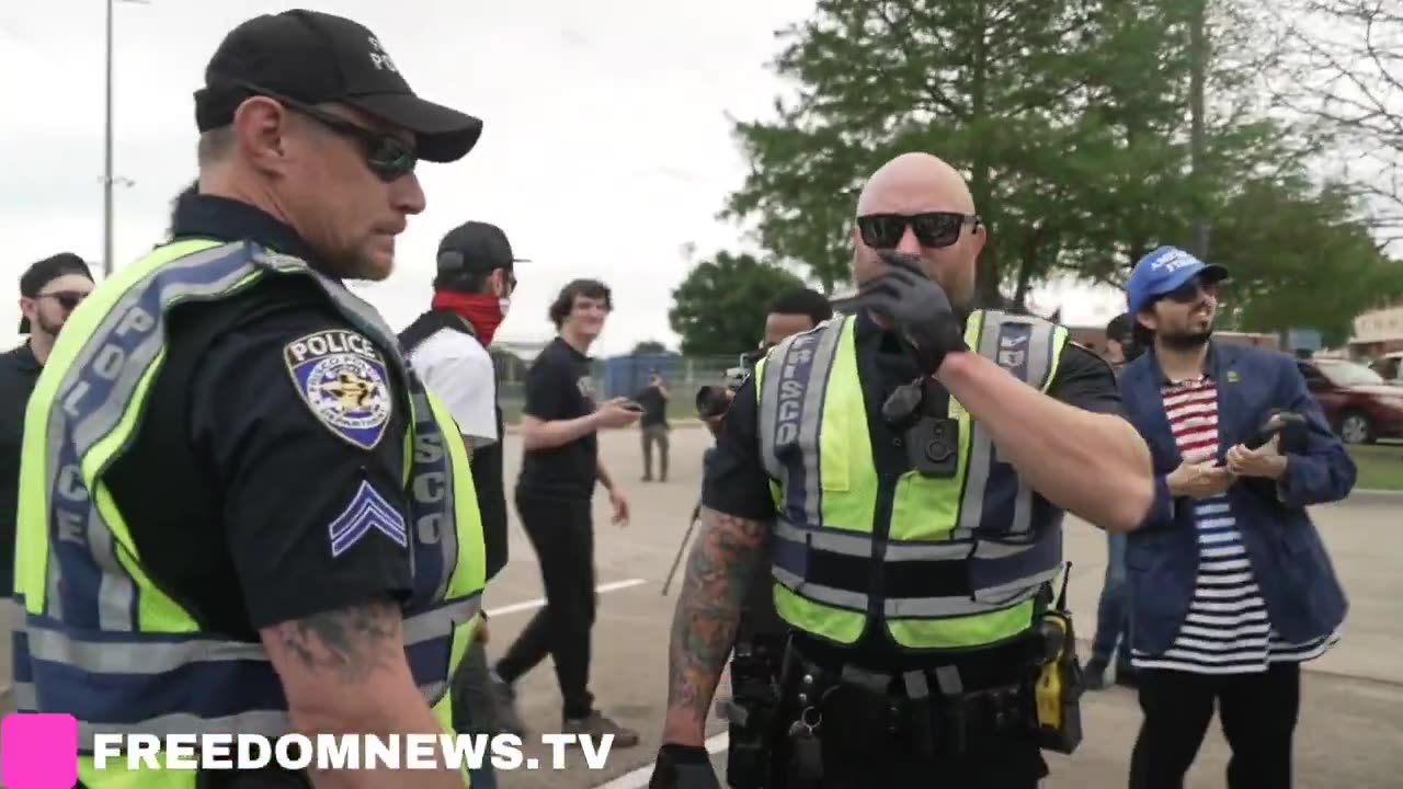 NOW_ Man in Carmelo Anthony jersey confronts _Protestors