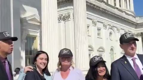 Rep. Eric Swalwell gives “Stand Up for Jimmy Kimmel” hats to House Democrats