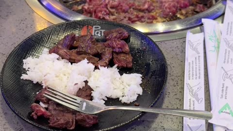At KPOT Korean BBQ & Hot Pot eating our dinner