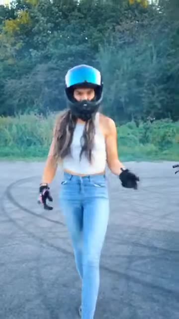 Young Lady Rides Motorcycle Like a Pro!