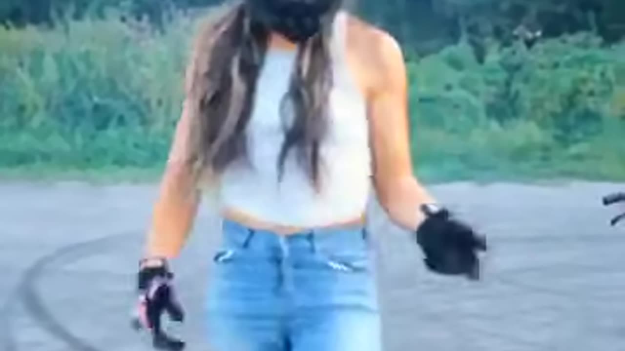 Young Lady Rides Motorcycle Like a Pro!