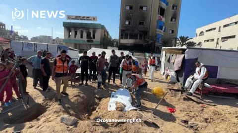 Gaza’s families rebury bodies at Deir el-Balah cemetery