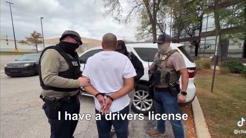 This illegal alien tries to tell immigration officers that his drivers license is proof