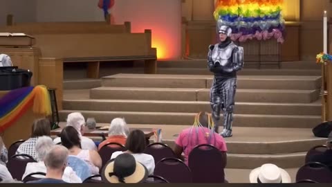 The so-called 'pastor' of this fake Christian church dresses up as RoboCop to denounce ICE