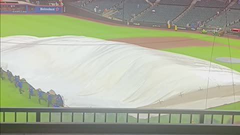 Taking off the tarp.