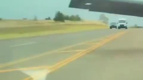 Tesla Full Self-Driving car dodges a plane falling from sky