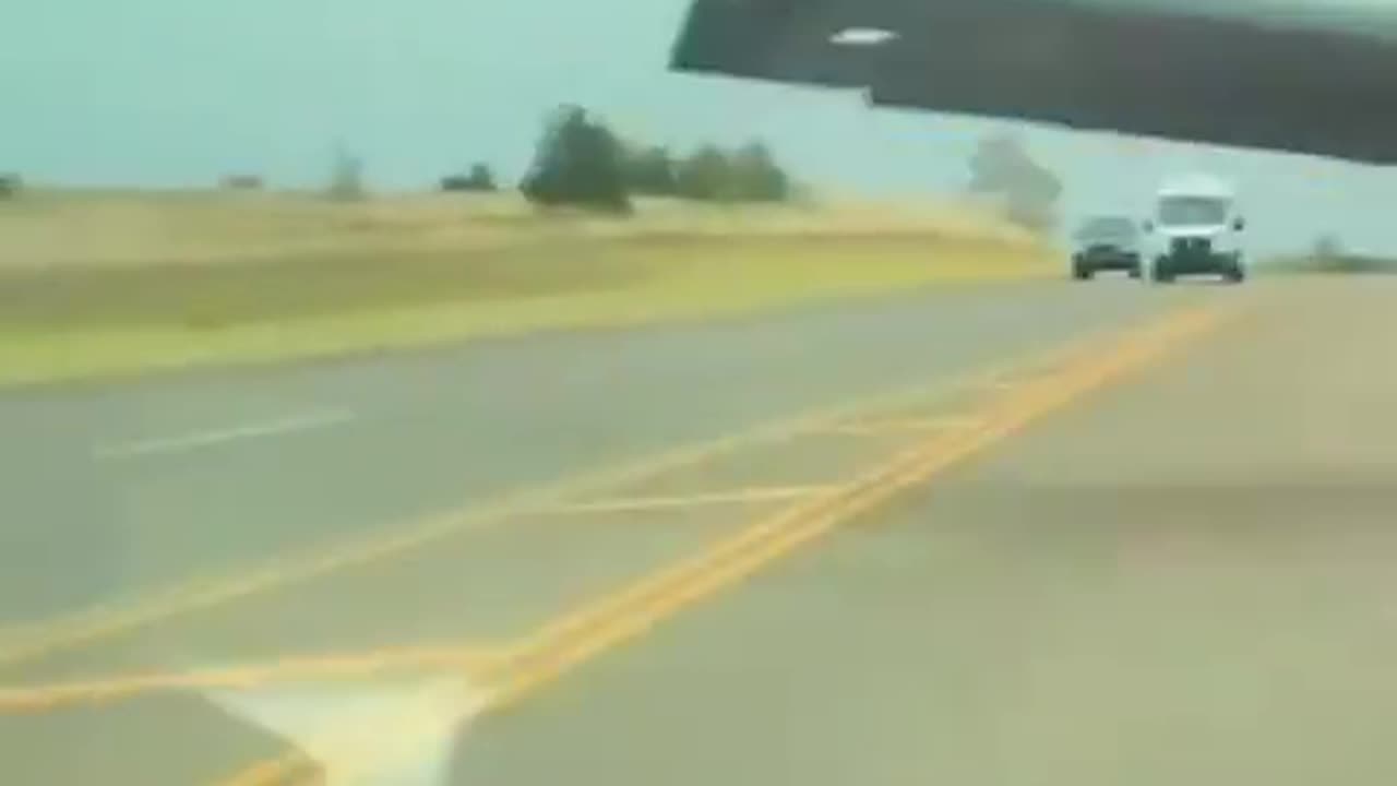 Tesla Full Self-Driving car dodges a plane falling from sky