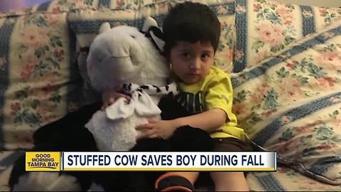 Huge stuffed cow saves 2-year-old boy after fall out window