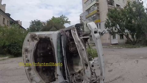 Ukrainian troops inspect the streets of Lisichansk