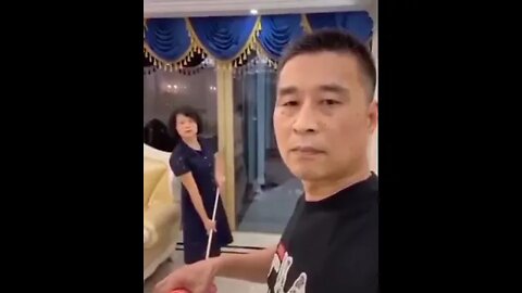 Man gets hit with a mop in the face