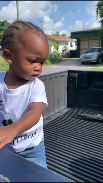 Baby boy playing ball