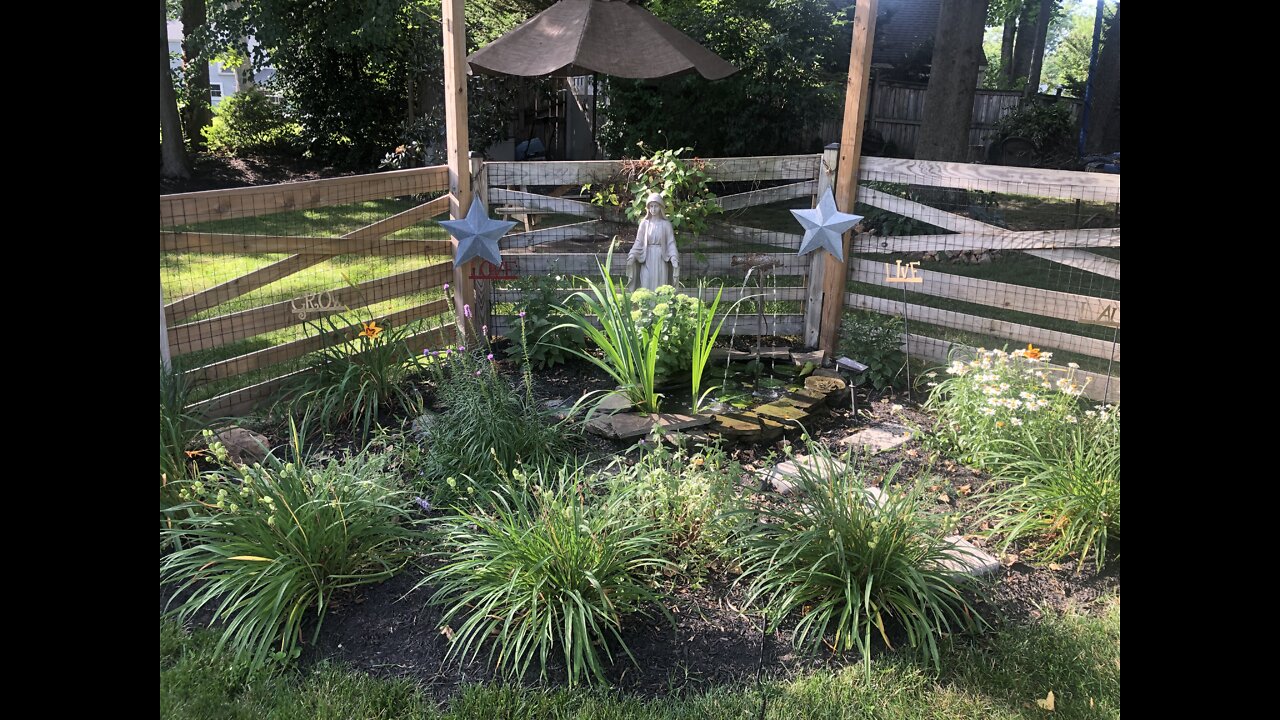 Relaxing video of the Mary Garden with falling water soundtrack.