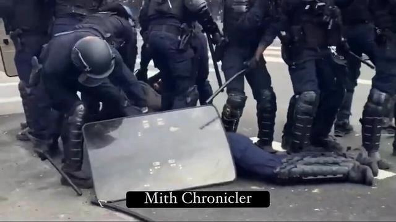BAM! KNOCKED OUT COLD! French riot cop hit with projectile drops like a sack of potatoes