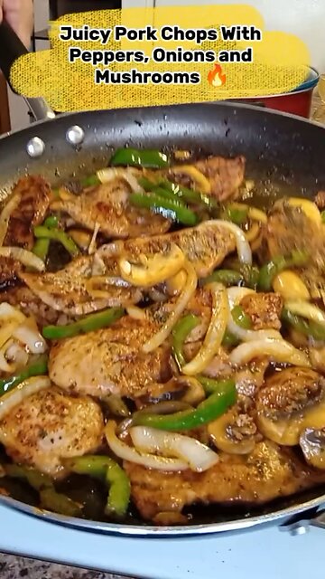 Juicy pork chops with onions and peppers