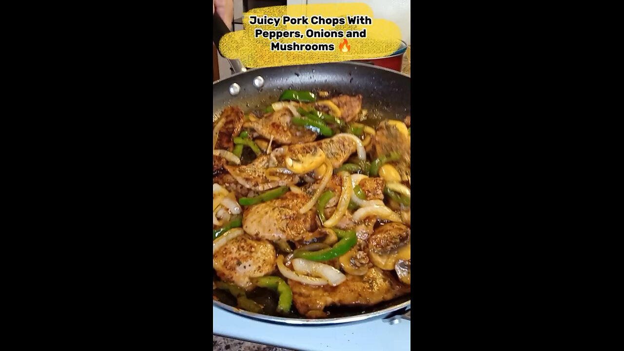 Juicy pork chops with onions and peppers