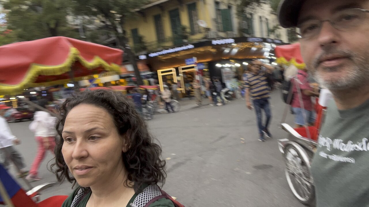 Crossing one of the busiest streets in Hanoi