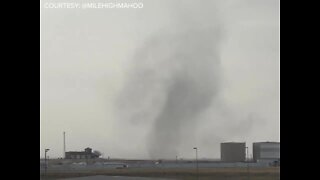 Gustnado seen at DIA as storms force ground stop