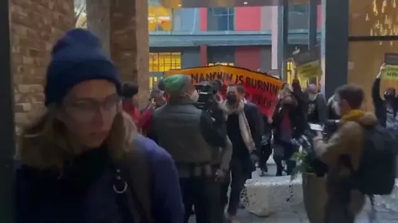 Climate Activists Confront Sen Manchin Chanting We Want to Live!