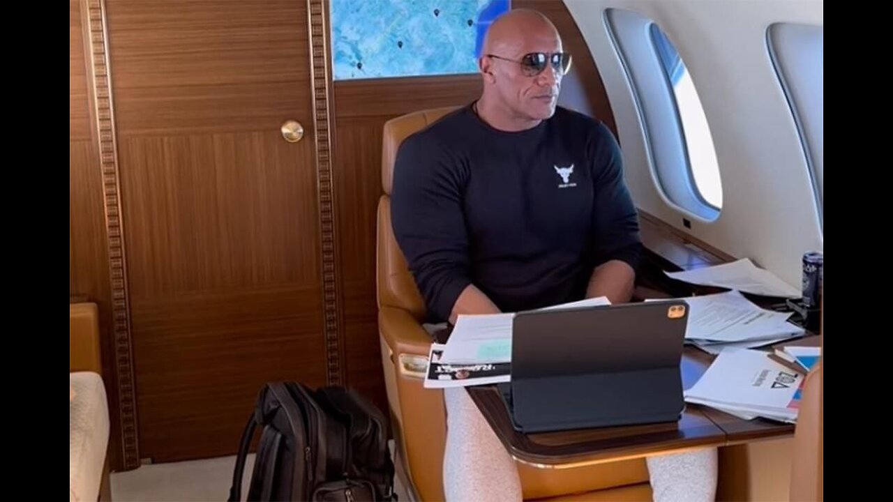 Dwayne Johnson taking action and attacking goals in 2023