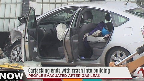 Car crashes into building in the Crossroads