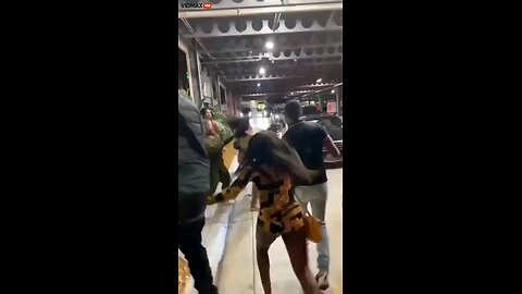 Parking lot brawl. Look at all the wigs & weaves coming off.