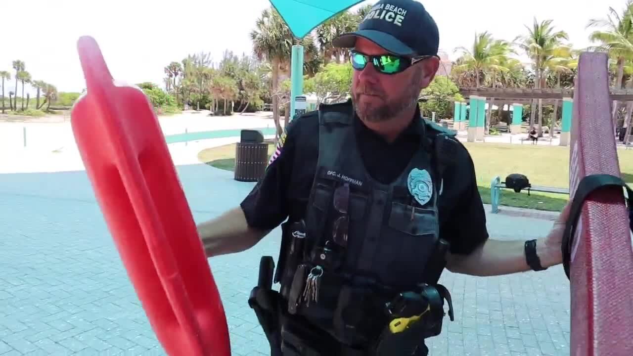 Riviera Beach police officer hailed a hero following rip current rescue